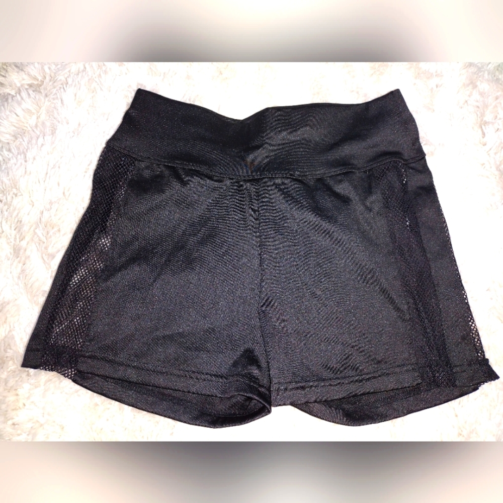New never used silky stretch shorts with see-through sides